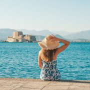 Female tourist posing in front of Nafplio